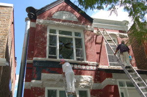 Everything for your house painting project under one roof! two house painters paint the exterior of a house